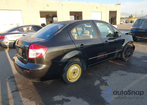 2011 Suzuki Sx4 Le/Le Anniversary Edition from USA, damaged, VIN JS2YC5A28B6302262